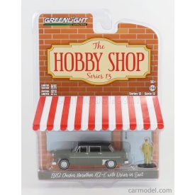 GREENLIGHT CHECKER MARATHON A12 WITH DRIVER IN SUIT 1982